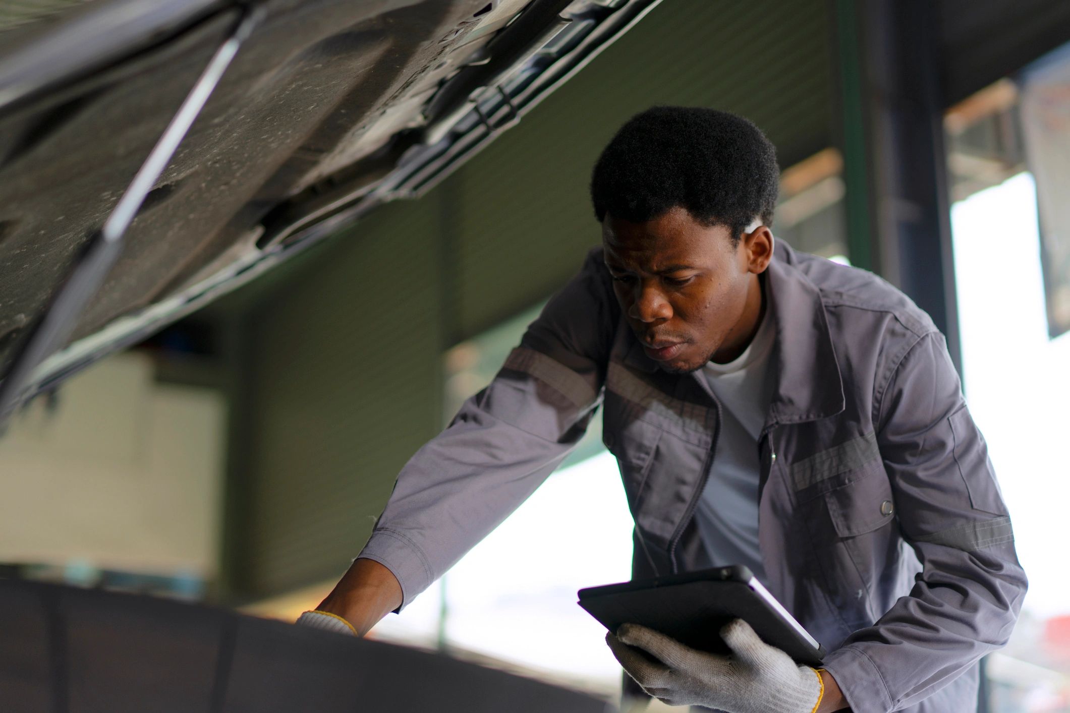 Automotive technician working in a service setting