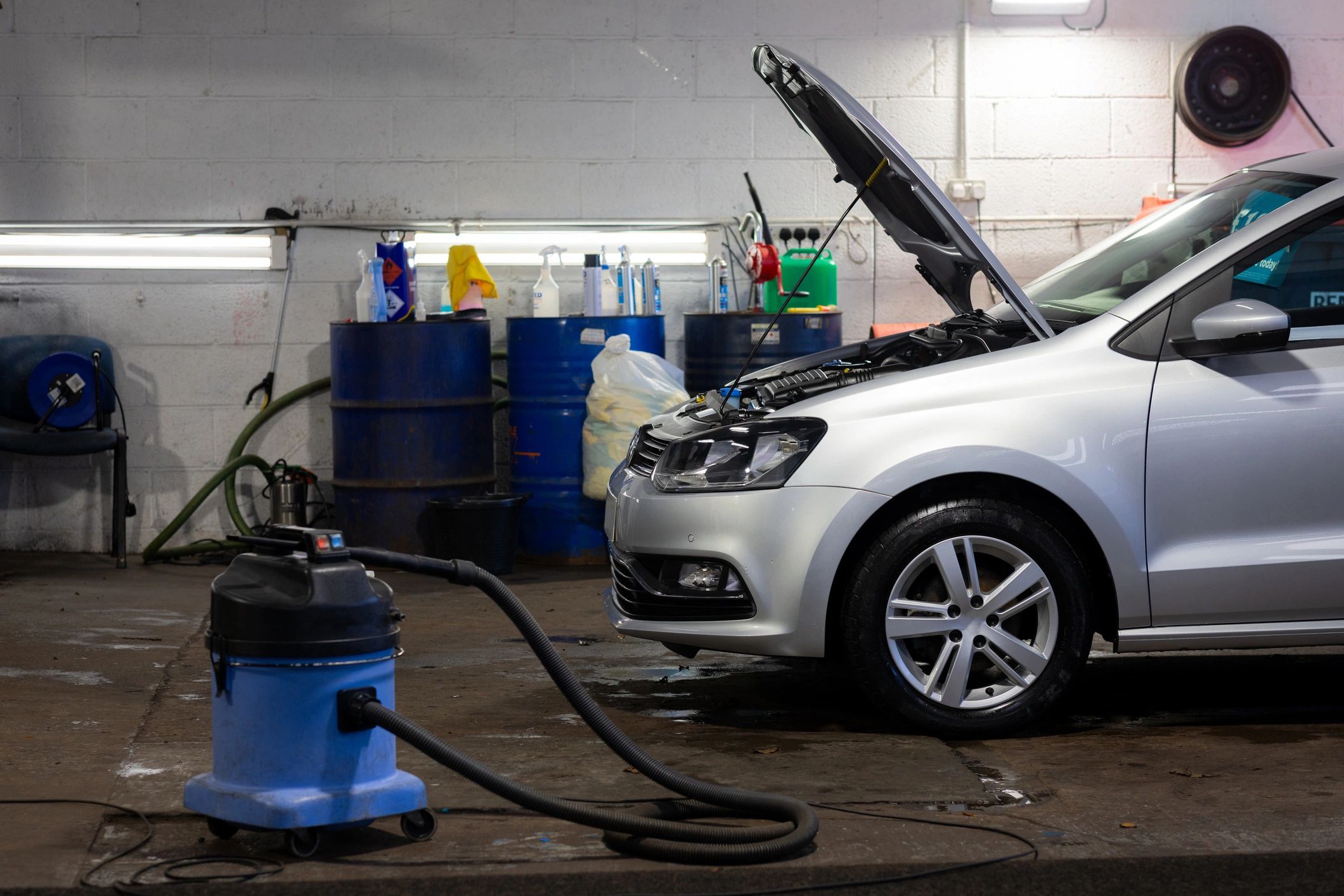 Vehicle receiving service with hood open